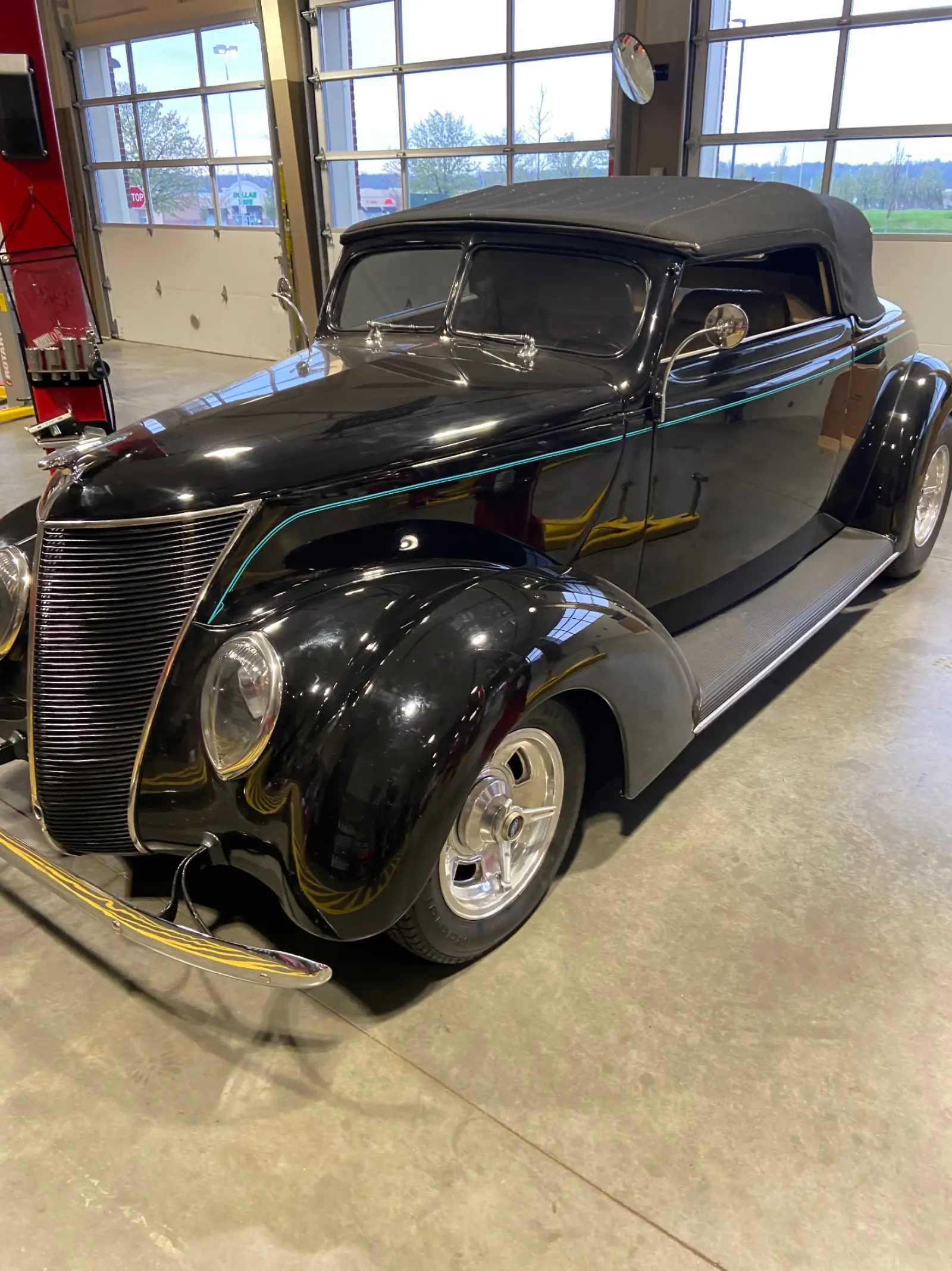 Black 1937 Ford hot rod convertible serviced at Pitt Stop Tire & Auto in Xenia, OH